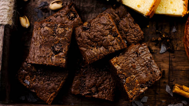 istock Different kinds of cakes arranged on a wooden tray 1475617640