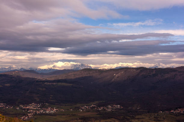 istock Krn mountain covered by snow top view from mont St Gabriel 1475620646