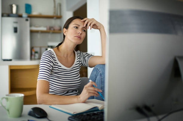 istock Young woman learning at home. 1475627066