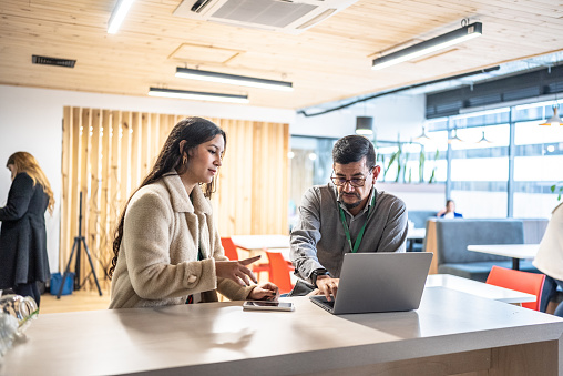 Coworkers working together in the office