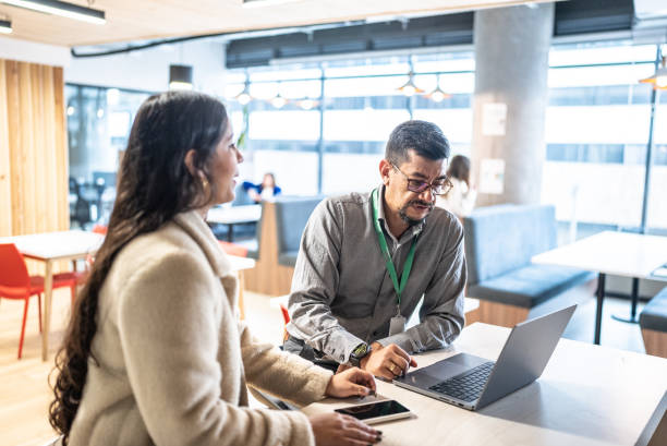 istock Coworkers working together in the office 1475627188