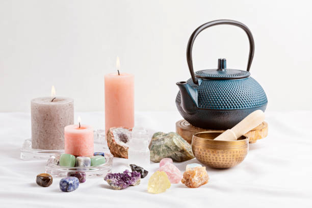 istock Healing reiki chakra crystals over fabric background. Gemstones for wellbeing, harmony, meditation, relaxation, metaphysical, spiritual practices. Energetical power concept 1475631963