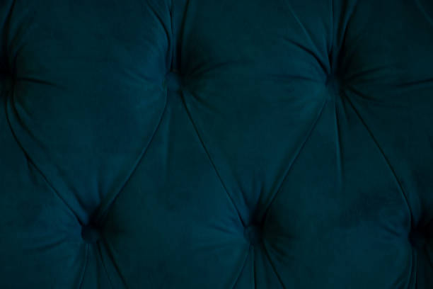 istock background of soft fabric wall with sewn buttons, bed side as background 1475632882
