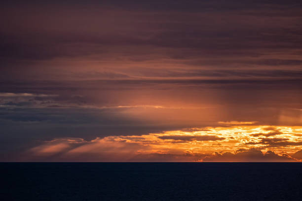 istock Sunset with dramatic clouds off the coast of Barcelona 1475635950
