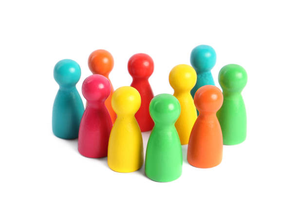 istock Colorful pawns on white background. Social inclusion concept 1475643064