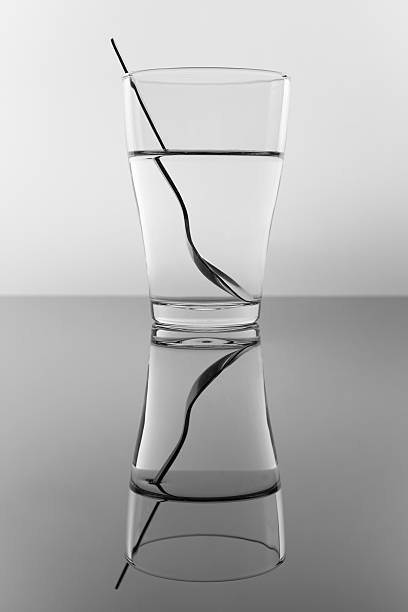 Example of the water refraction with a glass and spoon.