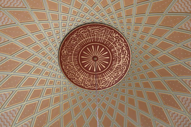 A ceiling with a circle design on it Taksim mosque dome