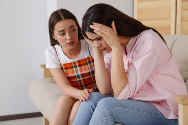 istock Professional psychologist working with young woman in office 1475645183