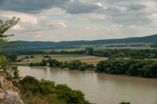 The Danube River with the walls of Devin Castle in the foreground in Bratislava, Slovakia