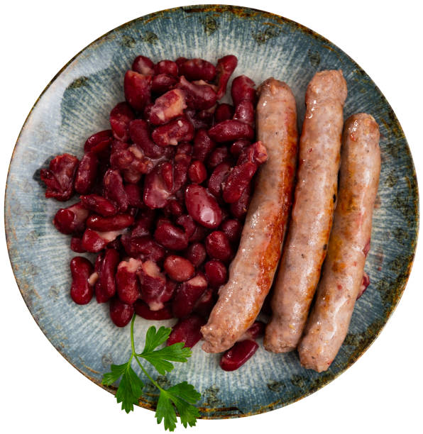 istock Sausages with red beans, typical Catalan dish butifarra con alubias 1475652100