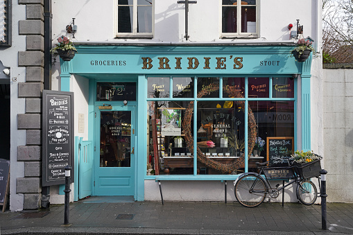 Kilkenny, Ireland - March 2023:  Colorful bar and shop in Kilkenny, Ireland