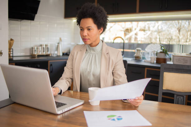 istock Mature woman working from home 1475656519