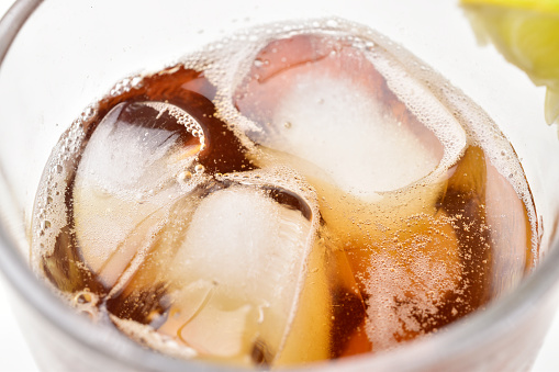 Close up of ice cubes in drink, unhealthy drink