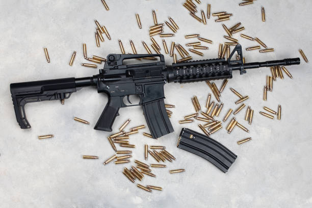 M4 carbine and 5.56mm shells and magazine with bullets