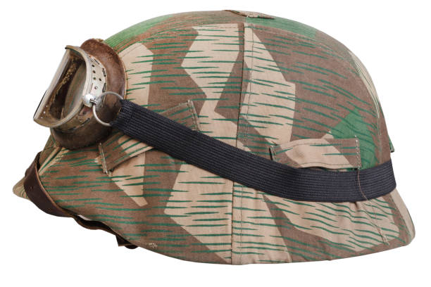 istock German army helmet with with protective goggles and camouflage cover 1475669219