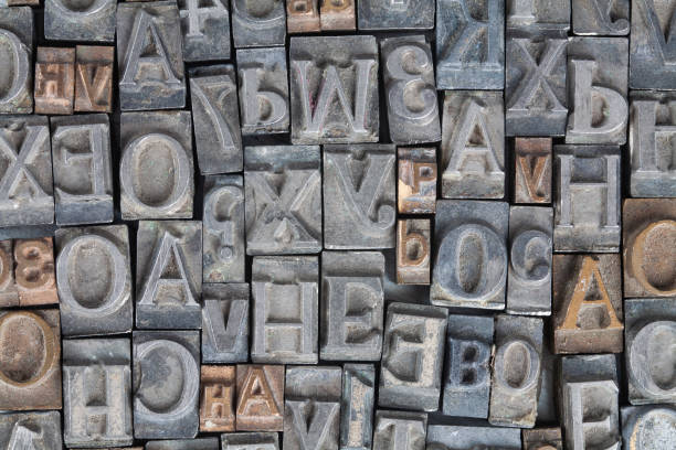 istock Antique vintage movable type alphabet set. 1475669294