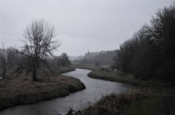 istock River winding into distance in rain 1475672174