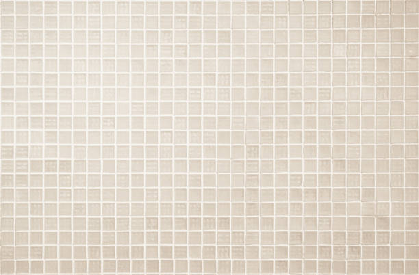 istock Cream light ceramic wall chequered and floor tiles mosaic background in bathroom, kitchen. Design pattern geometric with grid wallpaper texture decoration pool. Simple seamless abstract surface clean. 1475675729