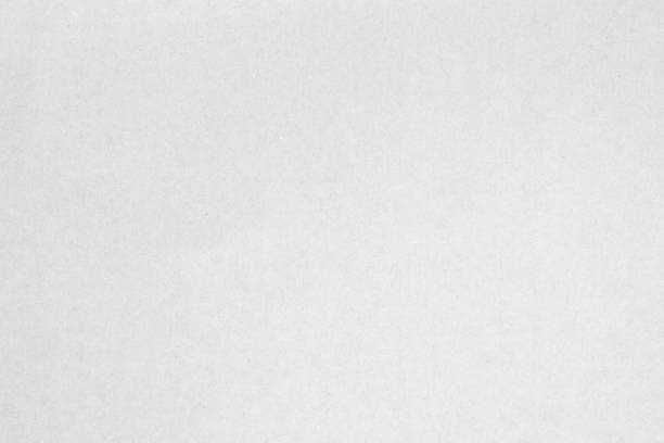 istock White recycled craft paper texture as background. Grey paper texture material, Old vintage page light wrinkle tone vignette of old newspaper and journal blank. Paperwork pattern letter for text. 1475675904