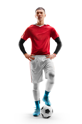 Soccer. Concept of sport, active and healthy lifestyle. Team game. Portrait of professional football player. Isolated over white background. Action