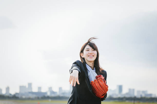 istock Japanese high school girl playing baseball 1475678060