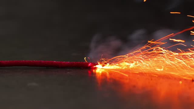 Macro shot of a burning fuse