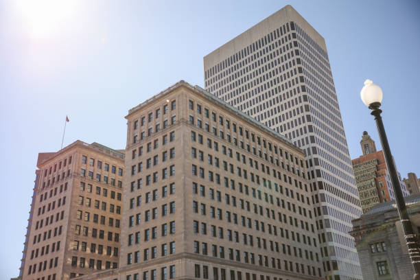 istock skyscraper's towering structure and old-fashioned architecture. multiple stories, with numerous rows of brickwork stacked upon each other to form its exterior walls. The bricks are weathered and worn 1475679239