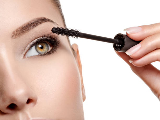 istock women eye with long black eyelashes and makeup brush 1475686628