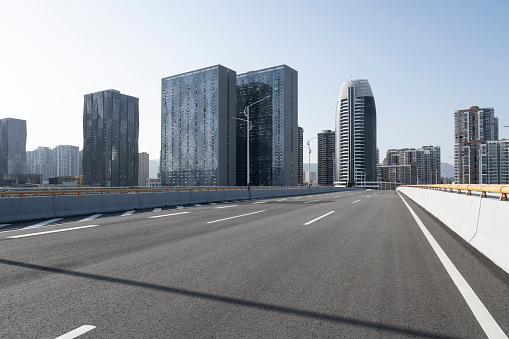 Urban transportation highway beside high-rise buildings