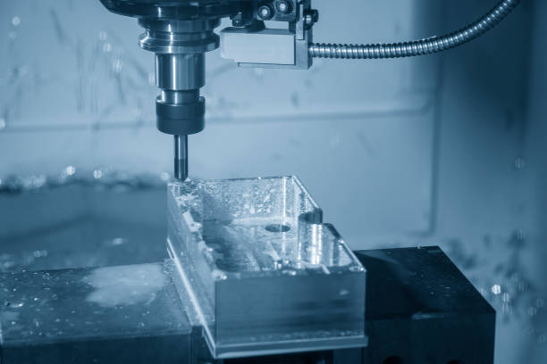 istock The CNC milling machine rough cutting with flat end mill tool. 1475701369
