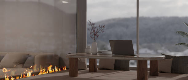 istock Modern home workspace interior design with laptop on a coffee table near the window 1475702069