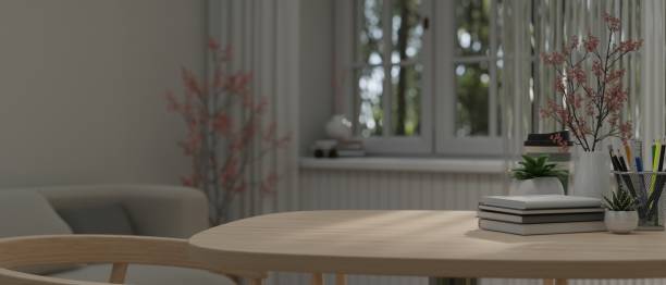 istock Empty mockup space on wooden tabletop or dining table in cozy living room 1475703172
