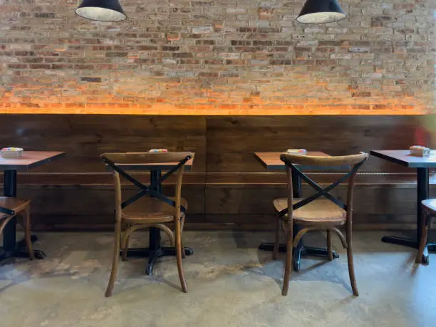 Photo of Blank table and chairs in a cafe