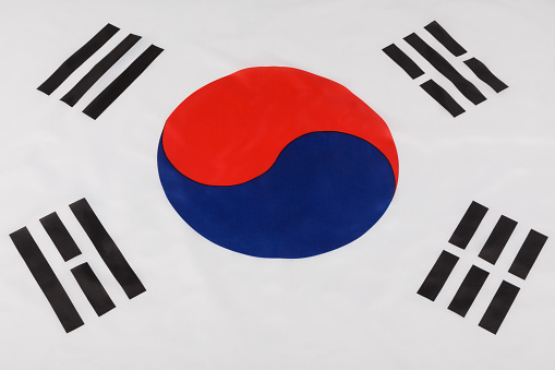 Close up of the official East Asian flag of South Korea with copy space