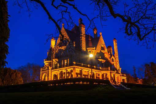 Victoria, British Columbia, Canada - March 3, 2023: The beauty of the Craigdarroch Castle glowing in the early evening light.
