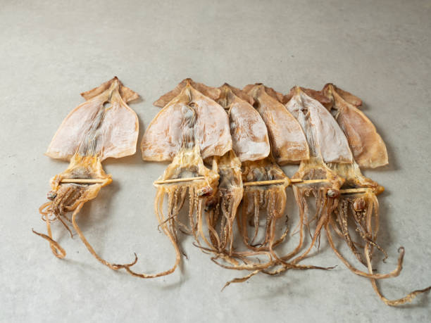 istock pile of dried squid on marble background 1475727208