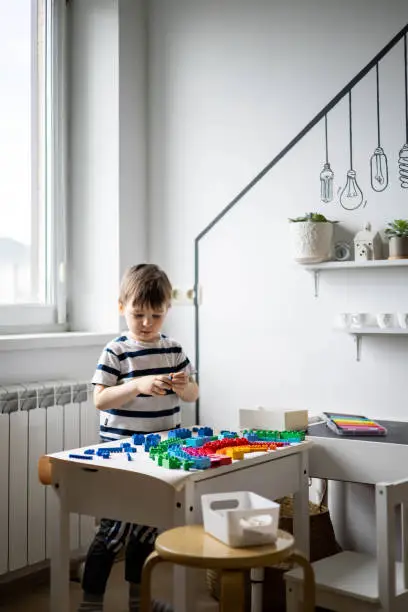 Khabarovsk, Russia, May 11, 2022. Classic Duplo geometric pieces drawing paper rainbow