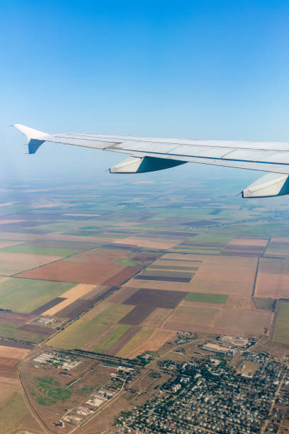 istock View from the airplane window during taking off on a clear summer morning 1475732471