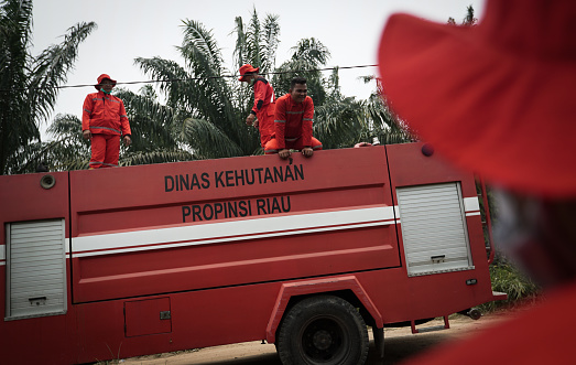 Riau, Indonesia, September 18 - Riau firefighters are preparing to extinguish the peatland fire. (Photo by Faiz Zulfikar/Getty Images)