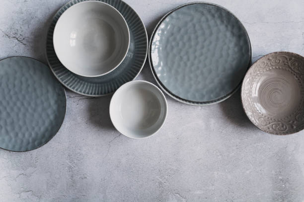 istock modern dishware collection in rustic grey and beige tones. Trendy ceramic plates. 1475744207