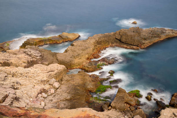 istock Discover Longdong's Breathtaking Coastal Landscapes - Dramatic Rock Formations. 1475760664