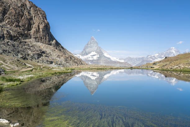 istock Matterhorn reflection in Riffelsee, Zermatt, Switzerland 1475766588