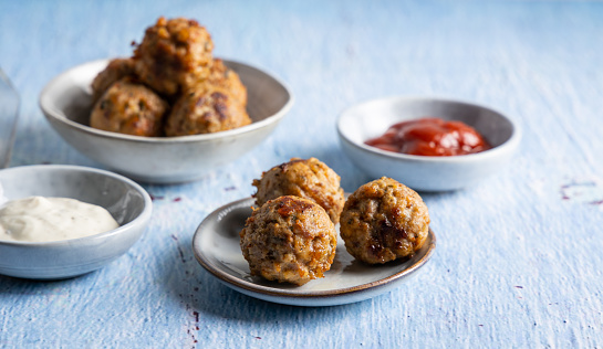 Homemade vegan meatballs on desktop table.