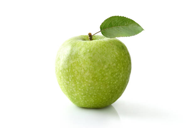 istock Green apple with leaf on white table and isolated background 1475778280
