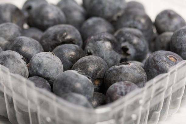 istock Large blueberries in a decorative container. International day without diets. Close-up. 1475780181