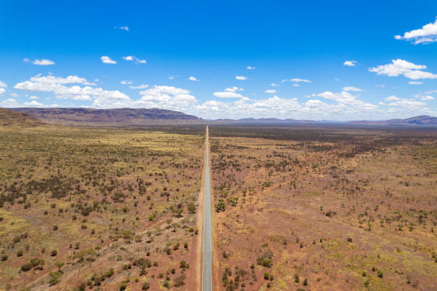 istock Long straight road in the Australian outback 1475780428