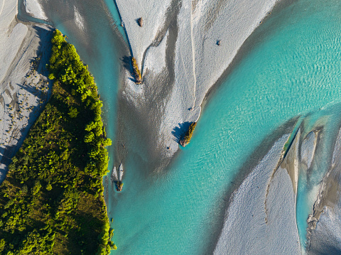 Drone view of glacier river flowing, at Rakaia Gorge, Canterbury, South Island, New Zealand.