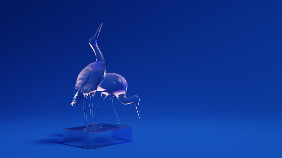 Two brids made of glass on a blue background. 3d illustration (rendering). Artistic illustration