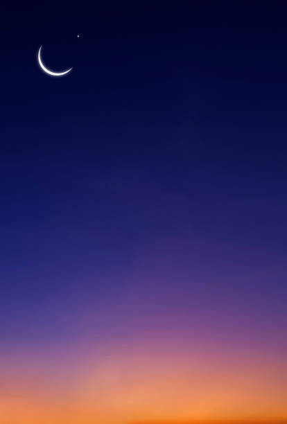 istock Crescent Moon and Star on beautiful Twilight Sky Background in Vertical frame 1475789428