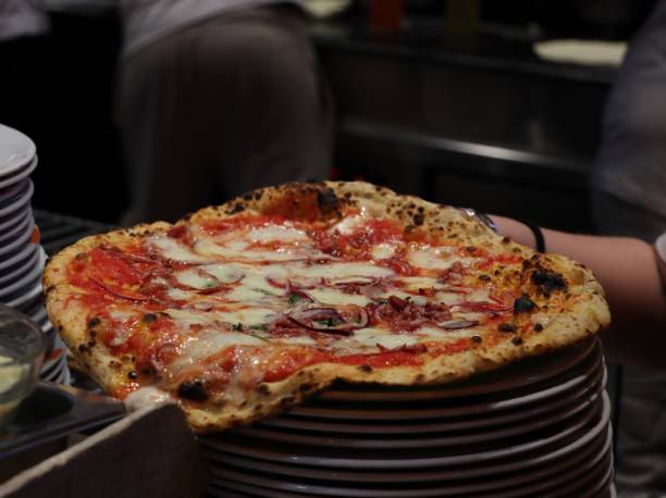 Authentic Neapolitan pizza. Pizza mass. Italian food. Restaurant.